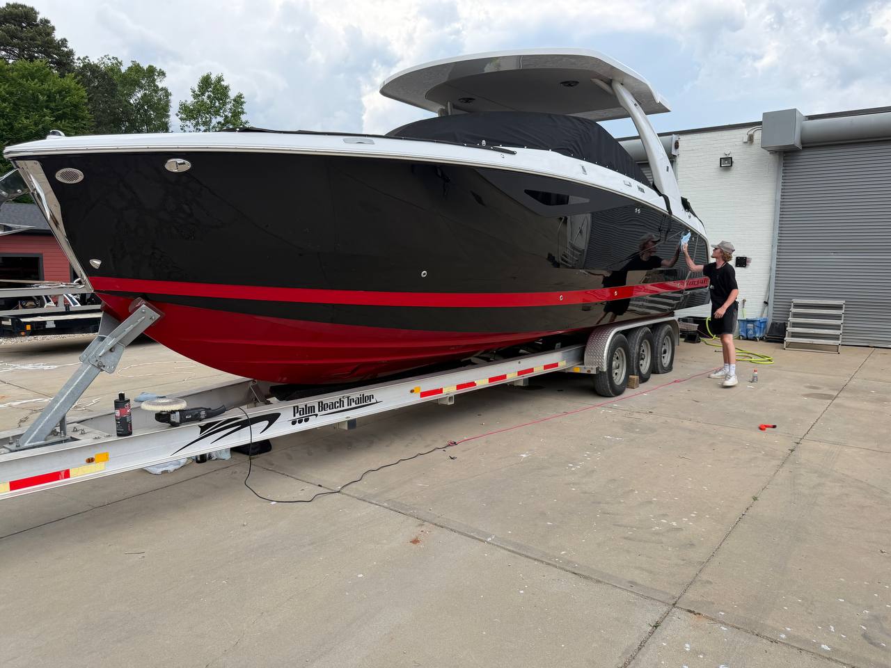 Team working on a boat at Prime's Auto Service
