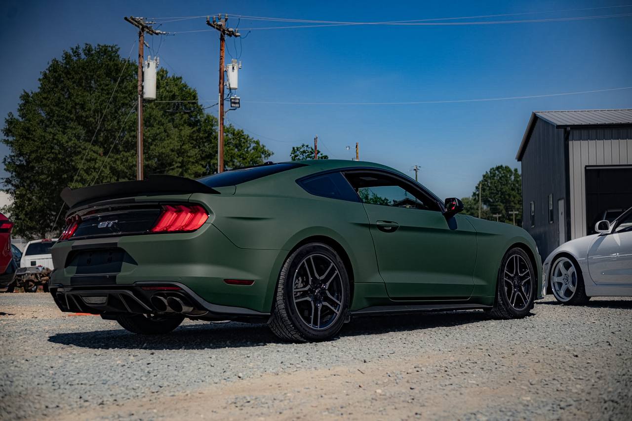 Matte green Mustang rear angle